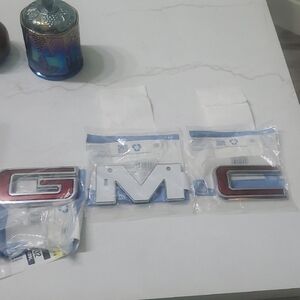 GMC Red and Silver Emblem Set